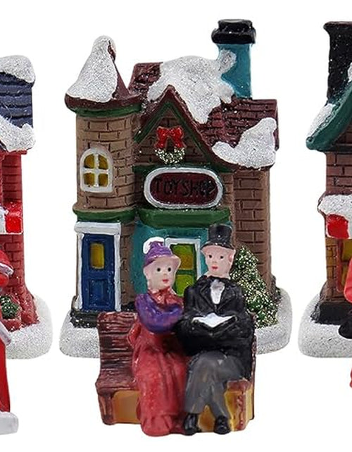 Load image into Gallery viewer, Christmas Village Set - Complete Decoration Includes Figurines and Houses - Perfect Addition to Your Christmas Indoor Decorations &amp; Snow Village Displays - Made of Resin (12 Piece Snow Village Set)
