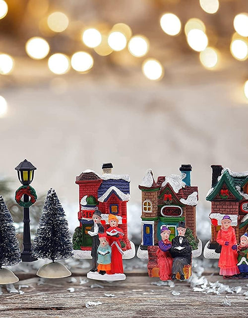 Load image into Gallery viewer, Christmas Village Set - Complete Decoration Includes Figurines and Houses - Perfect Addition to Your Christmas Indoor Decorations &amp; Snow Village Displays - Made of Resin (12 Piece Snow Village Set)
